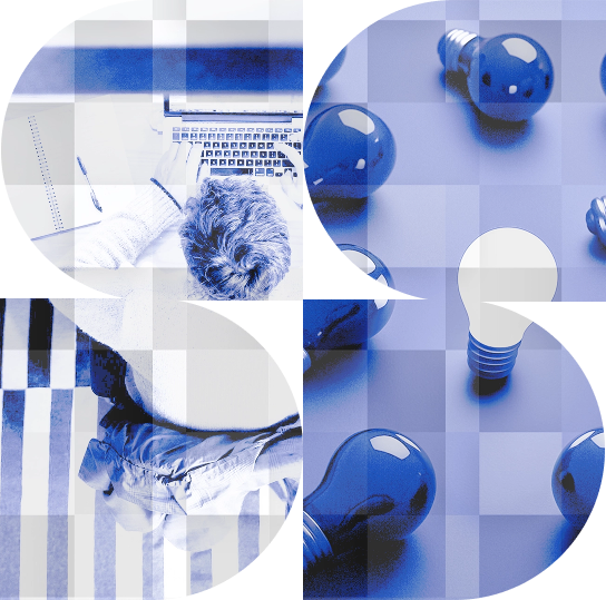 personne vue du dessus et travaillant à son bureau sur ordinateur