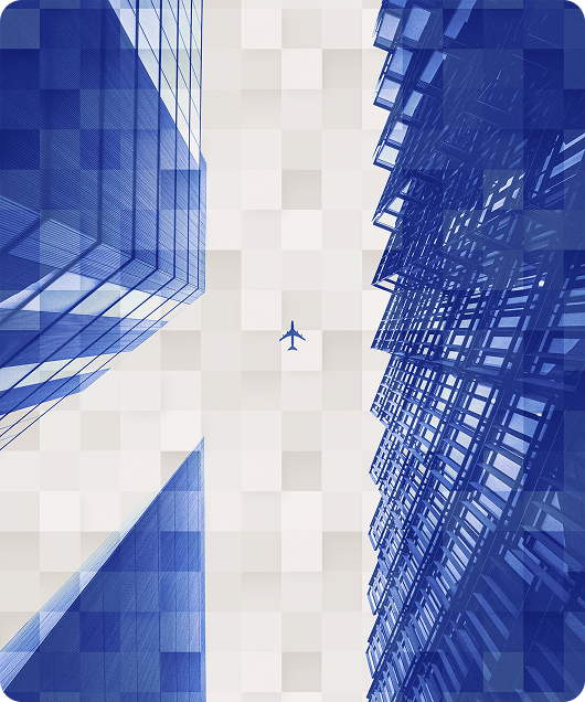 avion de ligne survolant des buildings